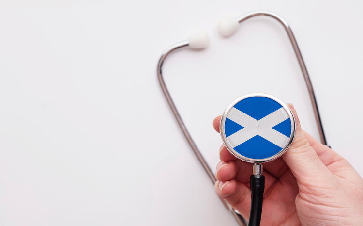 Scotland,Healthcare,Concept.,Doctor,Holding,A,Medical,Stethoscope.