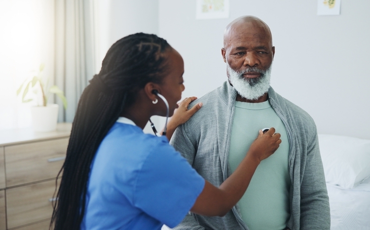 Senior,,Man,And,Nurse,With,Listening,On,Stethoscope,For,Heartbeat